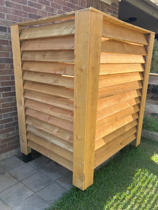 Wood horizontal louvered panels surrounding an A/C unit. Materials include 4"x4" posts and cedar pickets.