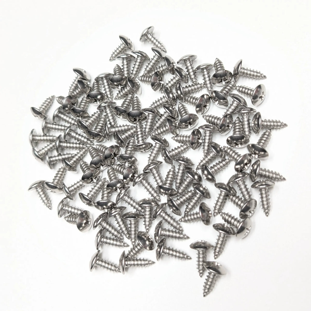 A pile of 100 5/8" Silver stainless steel truss-head slat screws on a white background. 