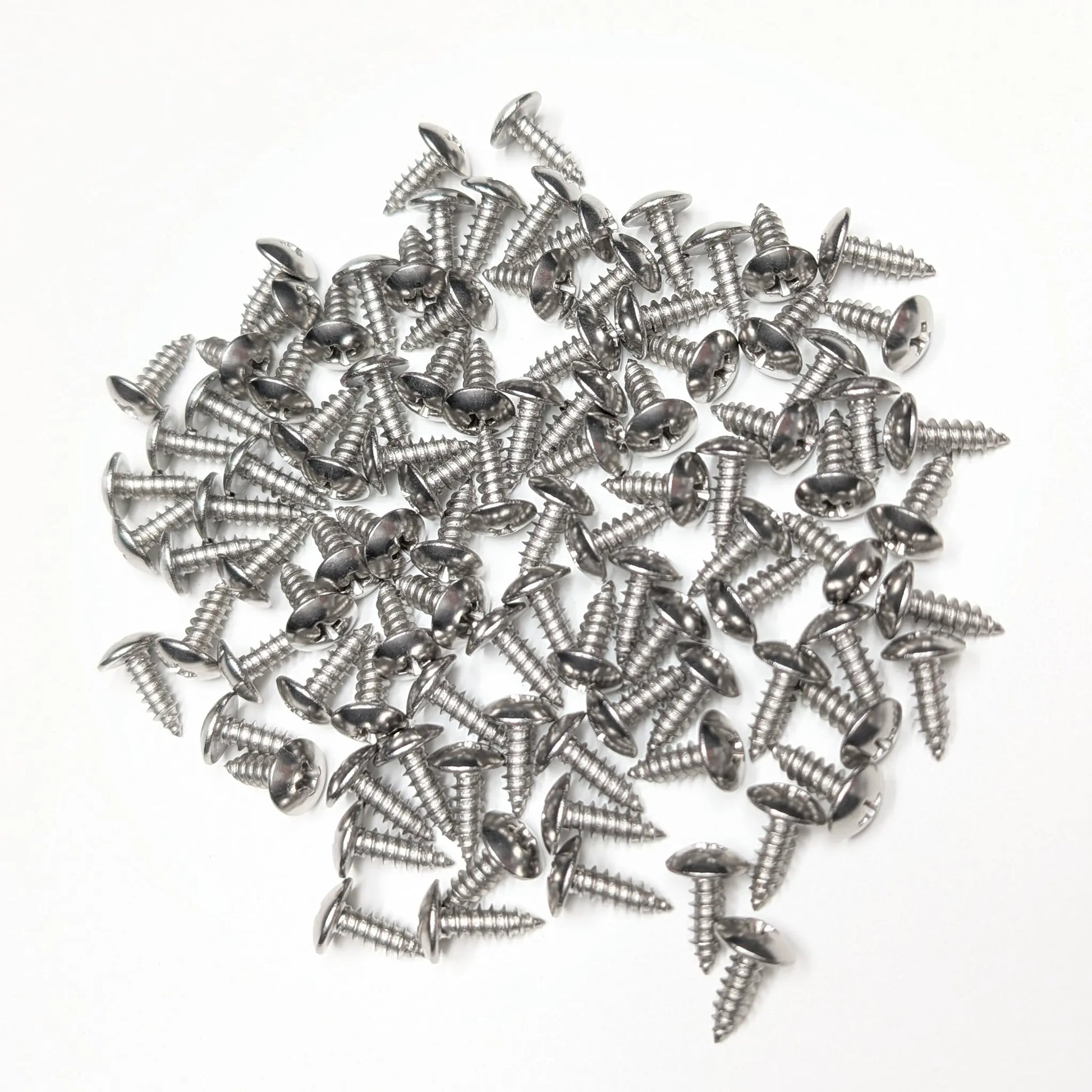 A pile of 100 5/8" Silver stainless steel truss-head slat screws on a white background. 