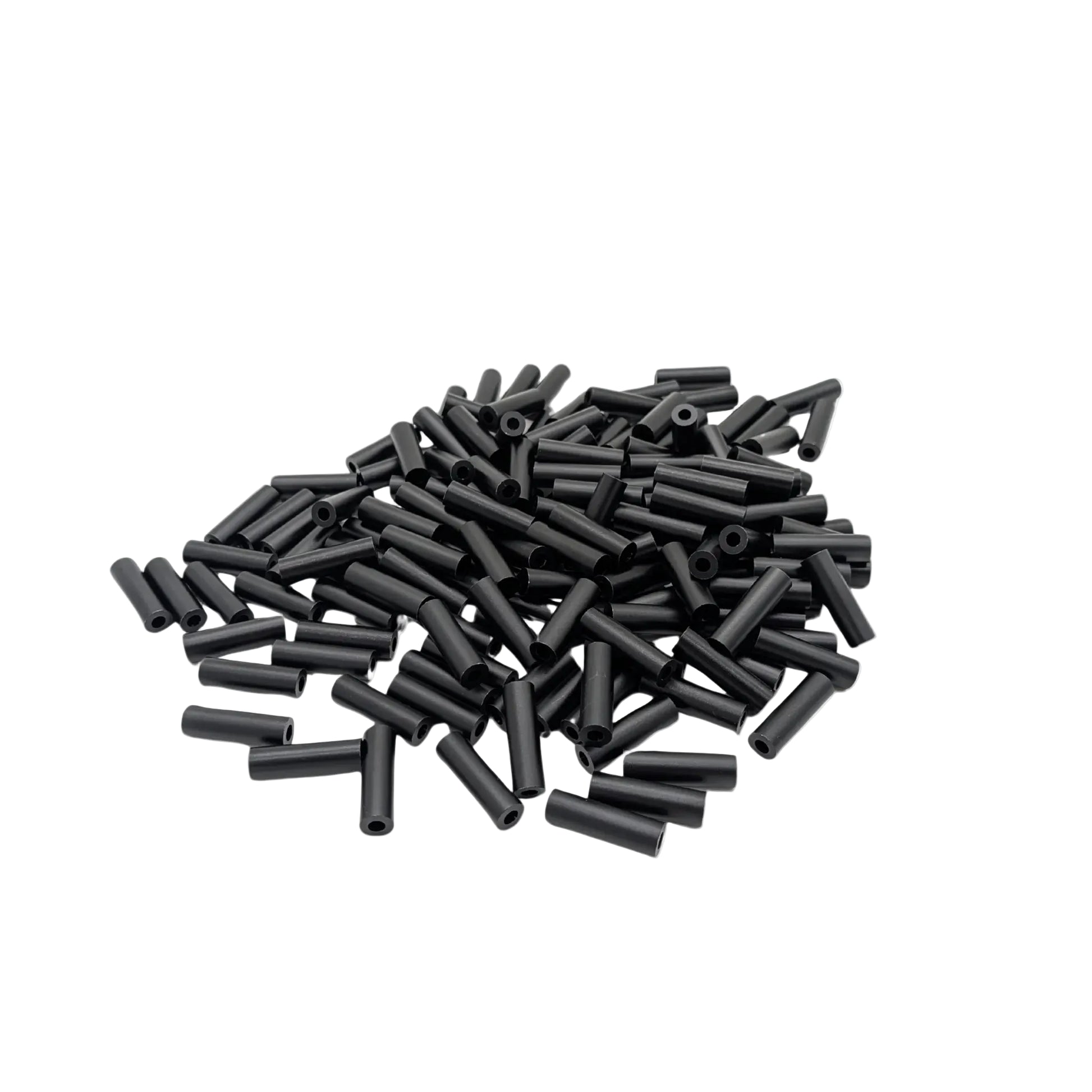 A pile of 150 black cylindrical spacers scattered on a plain white background.