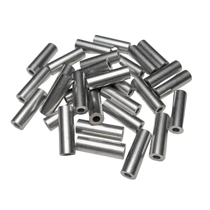 A pile of 30 silver spacers, arranged on a white background.