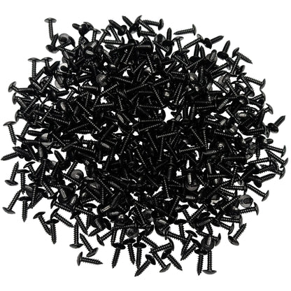A pile of black truss-head slat screws, scattered on a white background.