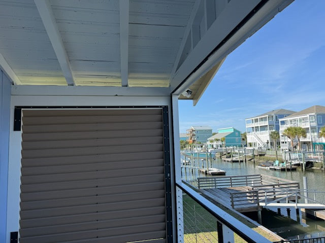 Patio Privacy Screen with PVC Slats using White EZ Louver brackets.