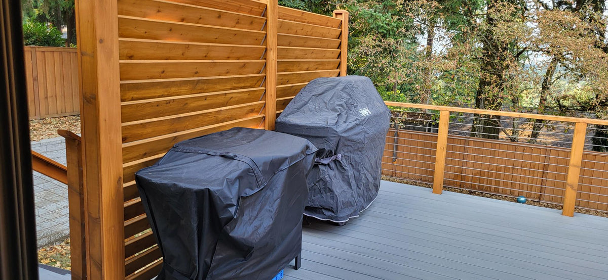 Louvered screen behind patio grilling area