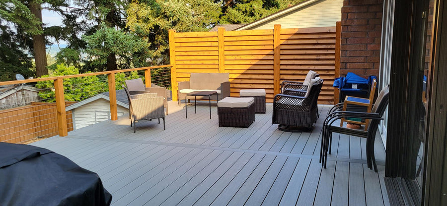 Louvered Privacy Screen next to sitting area on backyard patio