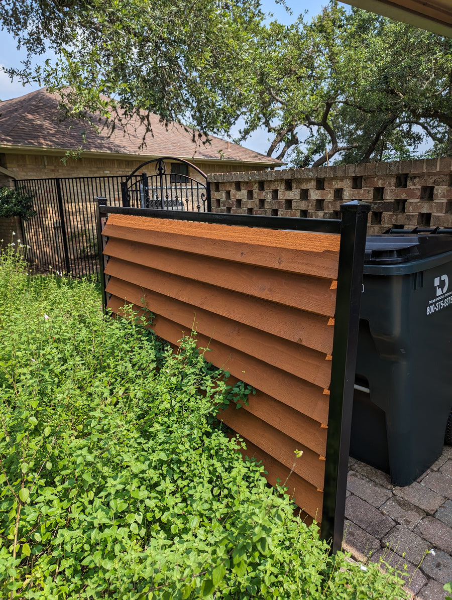 Louvered Panel Hiding Trash Cans