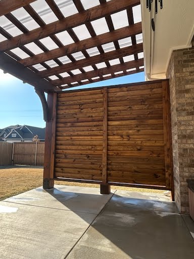 Stained Louvered Privacy Screen with Pergola
