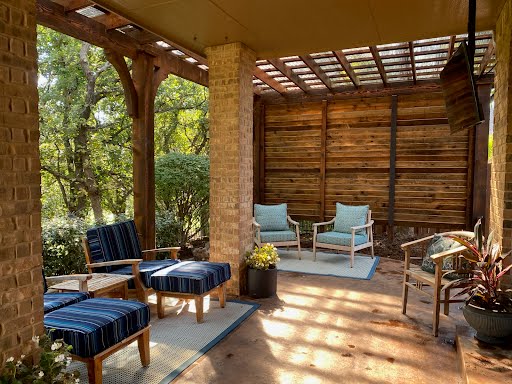 Gathering area in front of Louvered Screen under Pergola